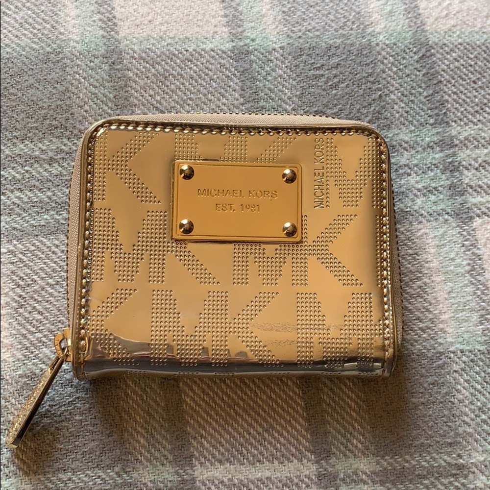 Michale kors gold logo wallet.